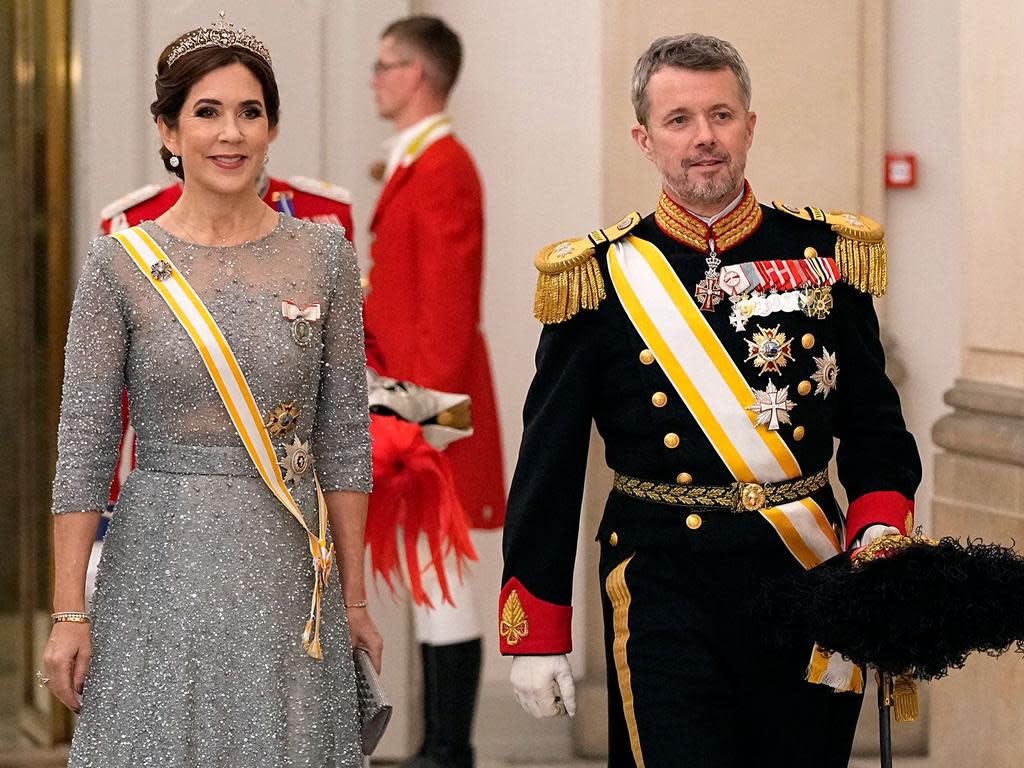 (FILES) The Crown Prince Couple, Crown Princess Mary of Denmark and Crown Prince Frederik of Denmark arrive for a State Banquet at Christiansborg Castle in Copenhagen on November 6, 2023, on the occasion of a visit of Spain's royal couple to Denmark. Denmark's popular Queen Margrethe II, Europe's longest-serving monarch, said on December 31, 2023 that she would abdicate on January 14, 2024 and pass the baton to her son Crown Prince Frederik. (Photo by Mads Claus Rasmussen / Ritzau Scanpix / AFP) / Denmark OUT