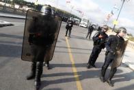 Police forces block the street as G7 summit opponents protest in Bayonne