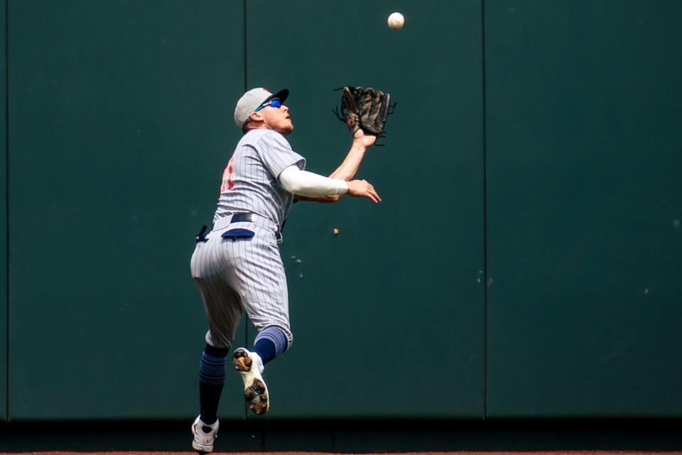 JaCoby Jones #21 of the Detroit Tigers catches a Kansas City Royals outfield hit in the fifth inning at Kauffman Stadium in Kansas City, Missouri, on Sunday, May 23, 2021.