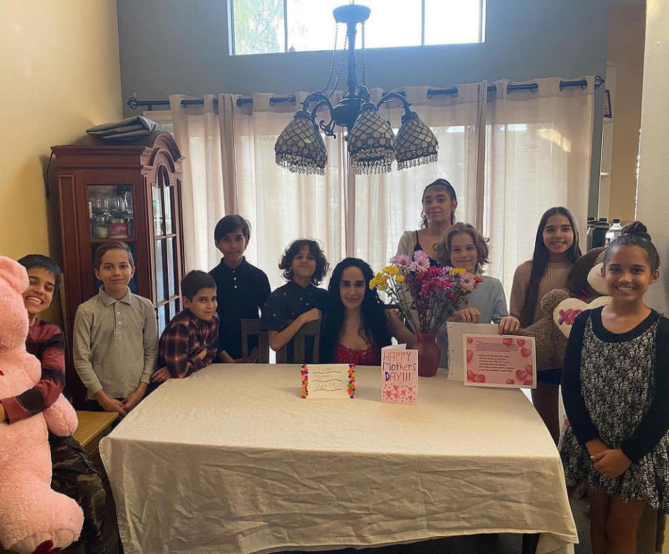 <p>On Mother's Day, 10 of 14 kids <a href="https://www.instagram.com/p/COrVhEKLSOw/?hl=en" rel="nofollow noopener" target="_blank" data-ylk="slk:posed for a photo" class="link ">posed for a photo</a> alongside Suleman to celebrate her with cards, flowers and large stuffed animals.</p>