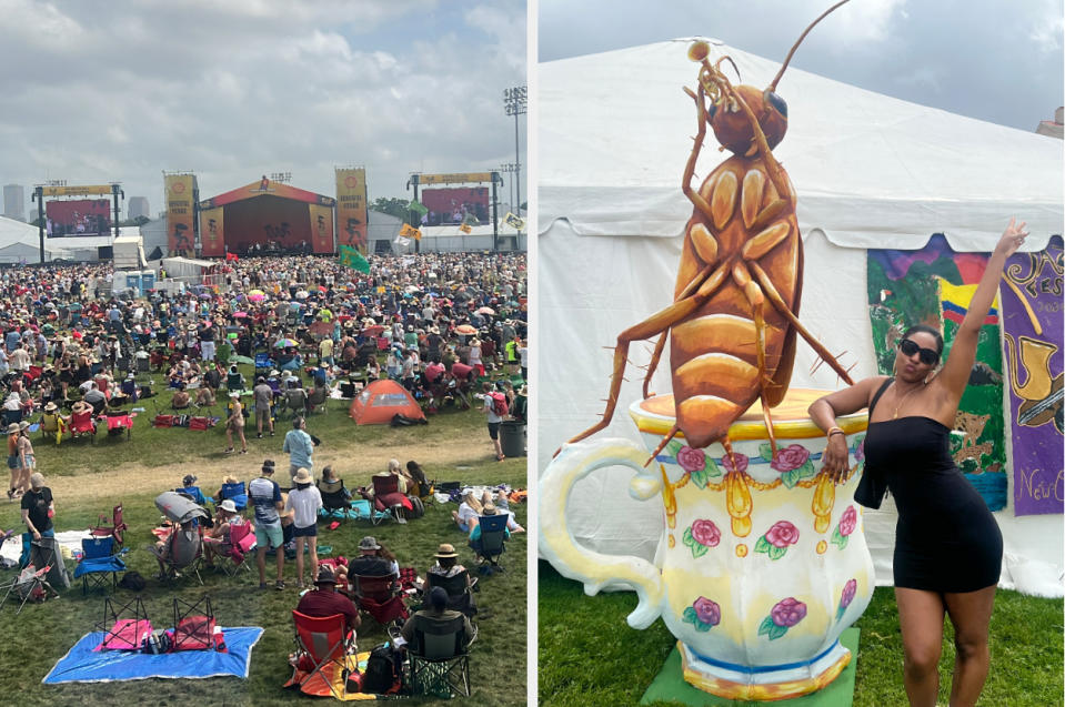 A large crowd enjoys an outdoor music festival. Nearby, a woman in a black dress poses near a giant grasshopper sculpture on a teacup