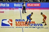 Jan 17, 2019; London, United Kingdom; New York Knicks guard Frank Ntilikina (11) brings the ball up court against the Washington Wizards at The O2 Arena. Mandatory Credit: Steve Flynn-USA TODAY Sports