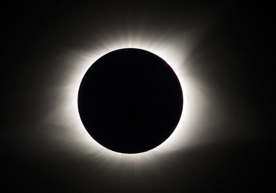 The moon blocks the sun during a total solar eclipse Aug. 21, 2017, over Hayes Canyon Campground in Eddyville, Illinois. People in Chile, Argentina and parts of the Pacific Ocean will see a total solar eclipses on July 2. For Bloomington residents, a total solar eclipse will be visible on April 8, 2024. (Robert Franklin / South Bend Tribune)