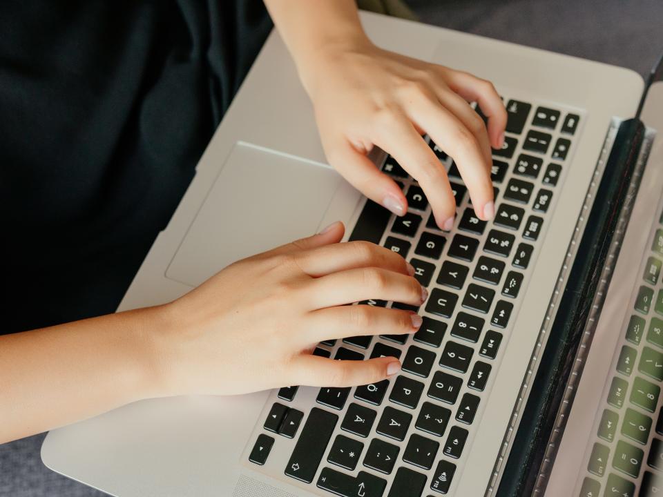 typing computer laptop