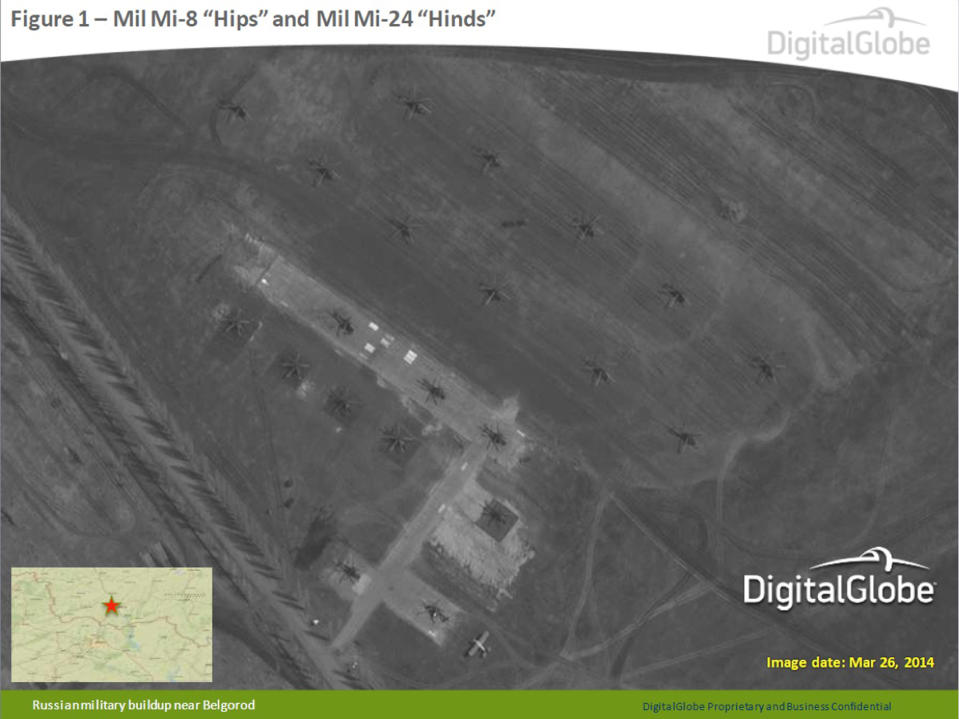 This satellite image made by DigitalGlobe on March 26, 2014, and provided by Supreme Headquarters Allied Powers Europe (SHAPE) on Tuesday, April 9, 2014, shows what are purported to be Russian Mil Mi-8 "Hips" and Mil Mi-24 "Hinds" aircraft in Belgorod, southern Russia, about 50 km north of the Russian border with eastern Ukraine. The image is one of several provided to the AP by NATO’s headquarters that show dozens of Russian tanks and other armored vehicles, combat jets and helicopter gunships stationed inside Russian territory near to the eastern border with Ukraine. AP cannot independently verify the authenticity or content of this image. (AP Photo/DigitalGlobe via SHAPE) MANDATORY CREDIT, NO CROPPING OR MODIFICATIONS ALLOWED