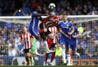 <p>Chelsea’s Victor Moses, left, jumps for the ball with Sunderland’s Bryan Oviedo during the English Premier League soccer match between Chelsea and Sunderland at Stamford Bridge stadium in London, Sunday, May 21, 2017. (AP Photo/Kirsty Wigglesworth) </p>