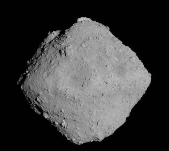 The carbonaceous asteroid Ryugu is seen from a distance of about 12 miles (20 km) during the Japanese Space Agency's Hayabusa2 mission