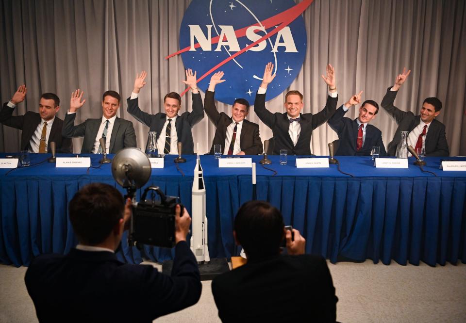 The Mercury 7 - Deke Slayton (Micah Stock), left, Alan Shepard (Jake McDorman), Wally Schirra (Aaron Staton), Gus Grissom (Michael Trotter), John Glenn (Patrick J. Adams), Gordon Cooper (Colin O'Donoghue) and Scott Carpenter (James Lafferty) - predict who they think will be the first U.S. astronaut in space in Disney+'s 'The Right Stuff.'