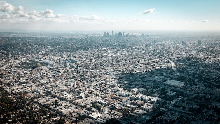 A bird's eye view of a sprawling cityscape.