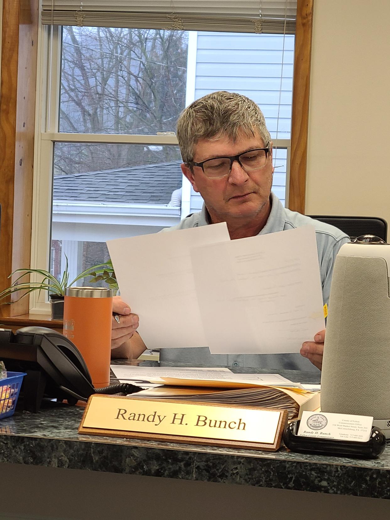 Fulton County Commissioner Randy Bunch takes part in a board meeting March 5.