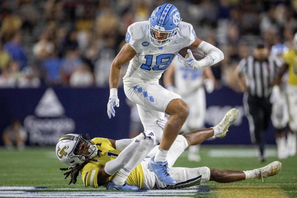 North Carolina’s Bryson Nesbit (18) picks up 46-yards on a pass from quarterback Drake Maye to set up the Tar Heels’ third touchdown in the second quarter on Saturday, October 28, 2023 at Bobby Dodd Stadium in Atlanta, Georgia.