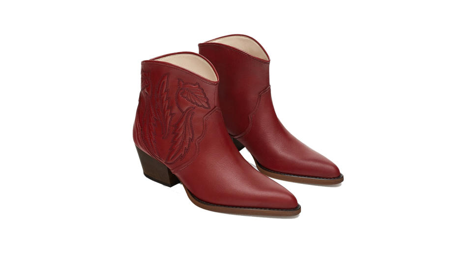 <p>Look no further for this season’s most coveted boots. From those hot pink Ganni numbers to Calvin Klein’s take on the western trend, the cowboy boot is dominating our Instagram feeds RN. If the knee-high option proves too daring start small with these ankle booties courtesy of Zara. <a rel="nofollow noopener" href="https://www.zara.com/uk/en/embroidered-leather-cowboy-ankle-boots-p16175301.html?v1=6936652&v2=1074517" target="_blank" data-ylk="slk:Shop now;elm:context_link;itc:0;sec:content-canvas" class="link "><em>Shop now</em></a>. </p>