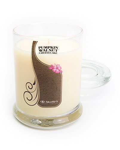 <p><strong>Shortie's Candle Company</strong></p><p>amazon.com</p><p><strong>$19.75</strong></p><p><a href="https://www.amazon.com/dp/B01874R6D4?tag=syn-yahoo-20&ascsubtag=%5Bartid%7C10050.g.34055055%5Bsrc%7Cyahoo-us" rel="nofollow noopener" target="_blank" data-ylk="slk:Shop Now;elm:context_link;itc:0;sec:content-canvas" class="link ">Shop Now</a></p><p>Pumpkin and walnuts make this no-calorie cheesecake candle a must-have for any sweet tooth. </p>