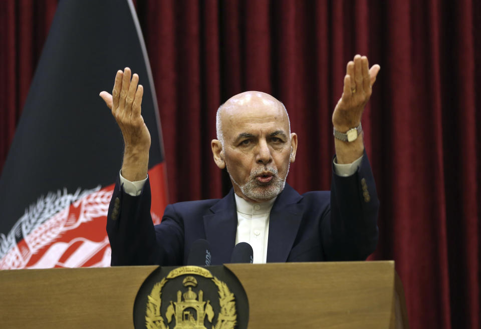 Afghan President Ashraf Ghani speaks during a news conference at the presidential palace in Kabul, Afghanistan, Sunday, March, 1, 2020. Ghani said Sunday he won't be releasing the 5,000 prisoners the Taliban say must be freed before intra-Afghan negotiations can begin. (AP Photo/Rahmat Gul)