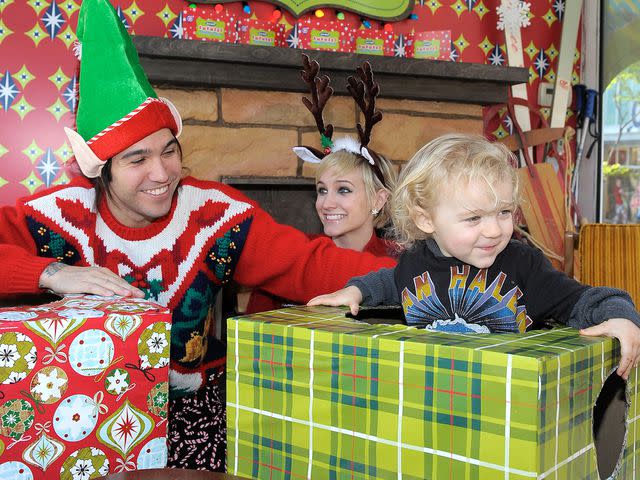 <p>Charley Gallay/WireImage</p> Pete Wentz, Ashlee Simpson and their son Bronx Mowgli Wentz pose for a family portrait onboard the Old Navy Awkward Holiday Photo Mobile on December 11, 2010 in Santa Monica, California.