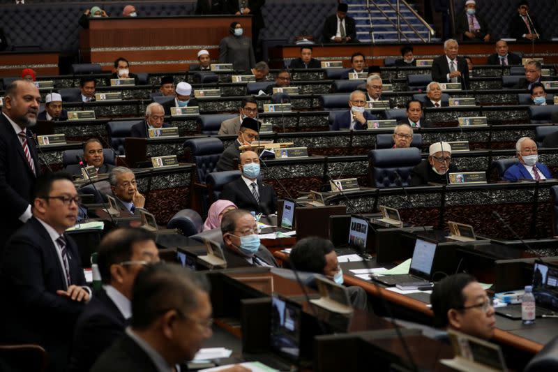 Malaysia's members of parliament attend a session of the lower house of parliament, in Kuala Lumpur