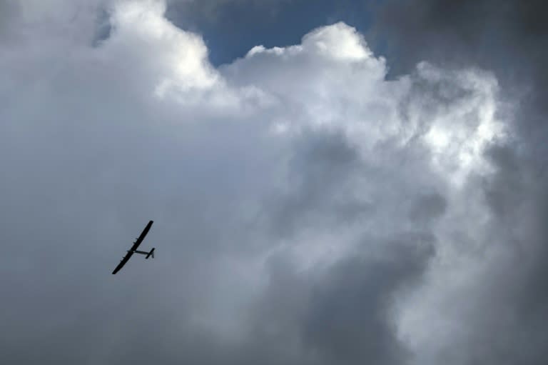 Solar Impulse 2, on the riskiest leg of a round-the-globe bid is closing in on Hawaii after a record-breaking flight that has tested its exhausted pilot to the limit in "difficult" conditions