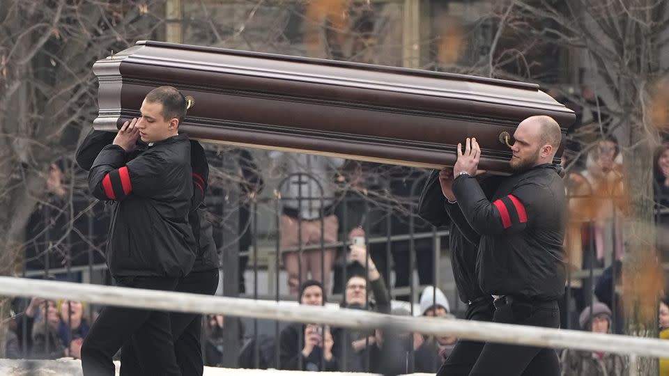 Mourners chanted "Navalny! Navalny!" as the Kremlin critic's coffin is carried to the Moscow church hosting his funeral. - AP
