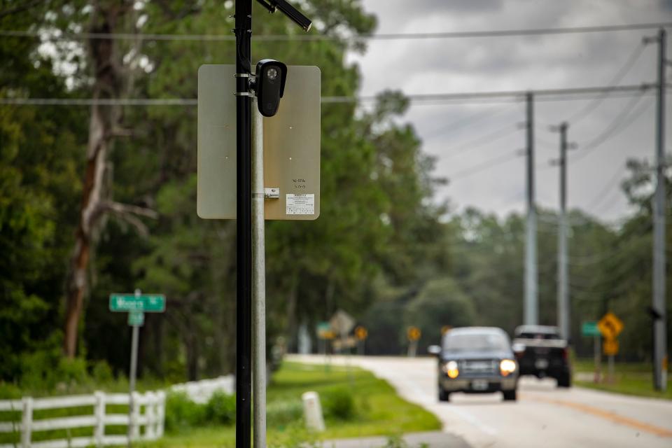 A Flock solar-powered camera at Old Polk City Road and Moore Road in Lakeland. The American Civil Liberties Union has encouraged residents nationally to oppose "centralized mass-surveillance" systems.