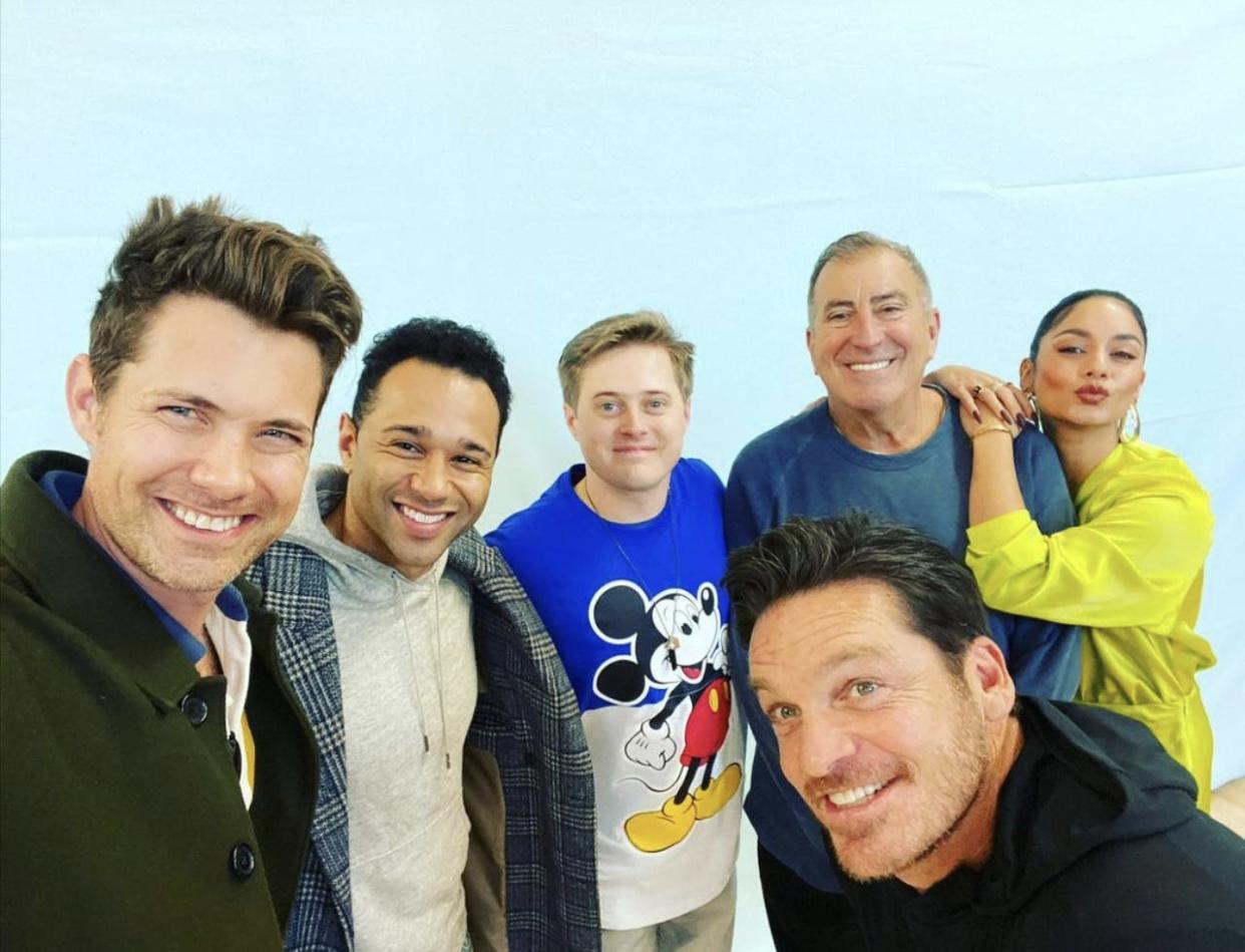 Drew Seeley, Corbin Bleu, Lucas Grabeel, Kenny Ortega, Vanessa Hudgens, and Bart Johnson pose for a photo at the Dream It Conventions in Paris, France, on November 12, 2022.