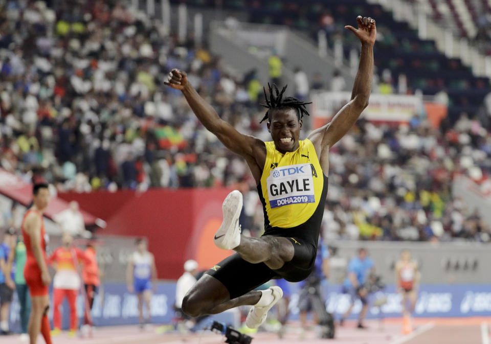 Tajay Gayle, of Jamaica, competes in the men's long jump final at the World Athletics Championships in Doha, Qatar, Saturday, Sept. 28, 2019. (AP Photo/Hassan Ammar)