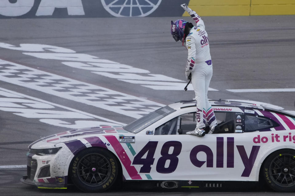 Alex Bowman (48) celebrates after winning a NASCAR Cup Series auto race Sunday, March 6, 2022, in Las Vegas. (AP Photo/John Locher)