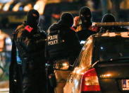 Belgian special police forces take part in an operation in the neighborhood of Molenbeek in Brussels, Belgium, November 22, 2015, after security was tightened in Belgium following the fatal attacks in Paris. REUTERS/Yves Herman