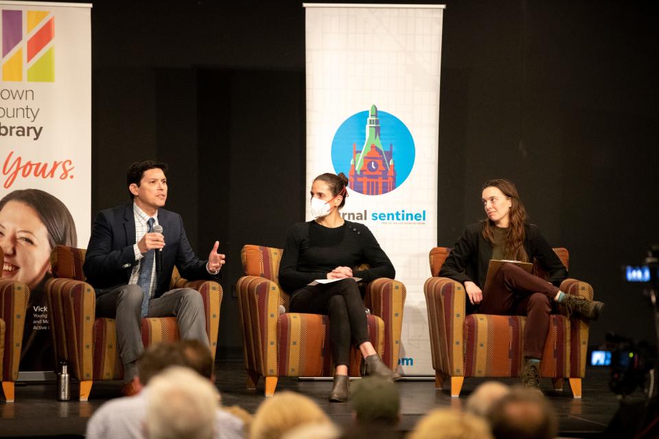 From left to right, Manny Teodoro, Sarah Halpern-Meekin and Morgan Edwards speaks during the Wisconsin Main Street Agenda: Green Bay Town Hall on Tuesday, Oct. 11, 2022, at Brown County Central Library in Green Bay, Wis.