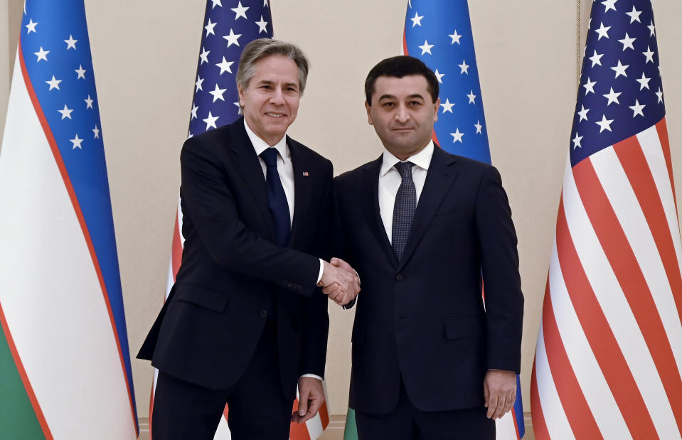 U.S. Secretary of State Antony Blinken, left, meets with Uzbekistan Acting Foreign Minister Bakhtiyor Saidov at the National Library in Tashkent, Uzbekistan Wednesday, March 1, 2023. (Olivier Douliery/Pool Photo via AP)