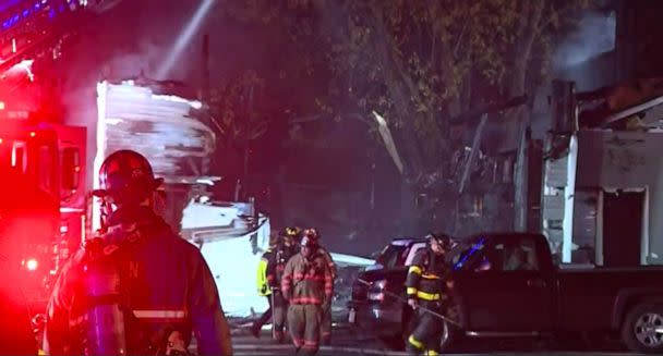 PHOTO: First responders work at the scene where a small plane crashed into a multifamily building in the evening of Oct. 21, 2022 in Keene, N.H. (WCVB)