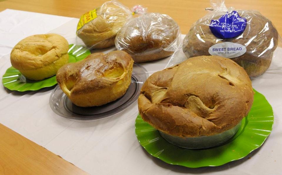 A spread of sweet bread from three different bakeries sit atop a table in the Herald News conference room in this file photo. From the left are: Amaral's, Lou's, and Tony's bakeries.