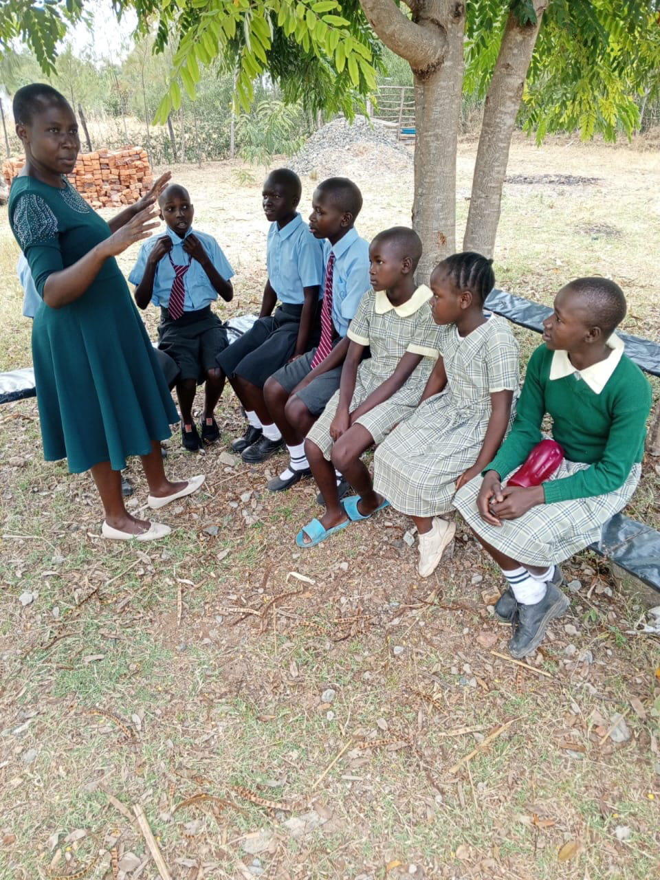 Sister Phenny, a high school teacher in Kisumu, Kenya, has a project to support girls and young women in her village. She is pictured instructing some of her students.