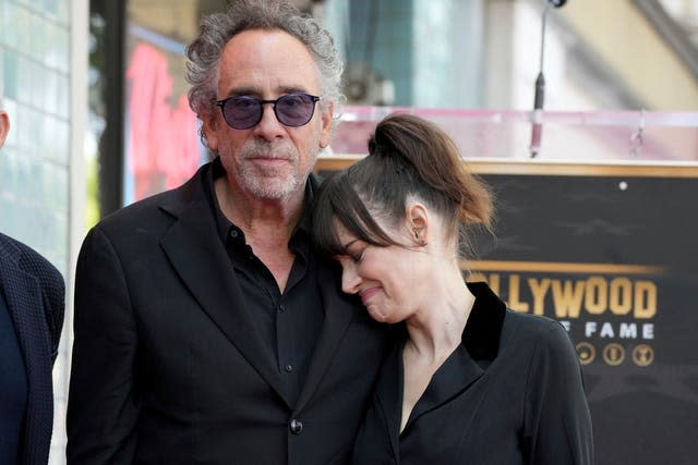 Tim Burton and Winona Ryder arrive at a ceremony honouring Burton with a star on the Hollywood Walk of Fame