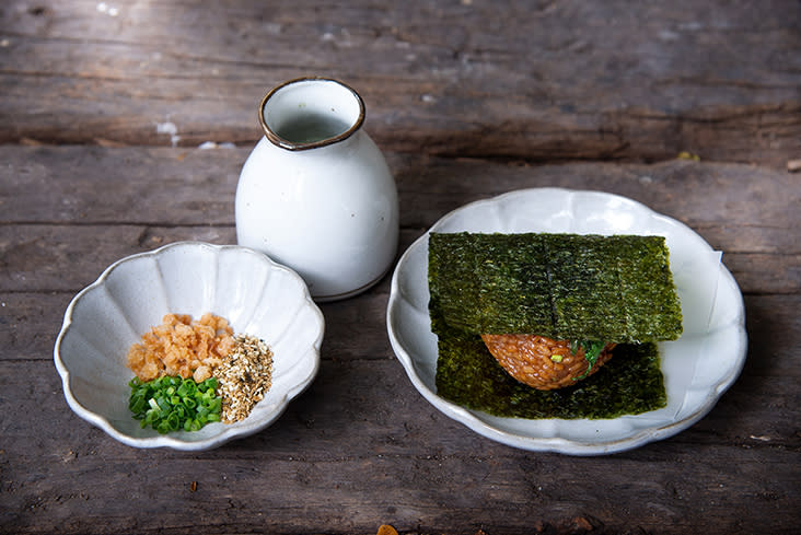 The 'onigiri' can also be eaten as 'ocha-suke' by dipping it into the condiments and adding green tea into the mix.