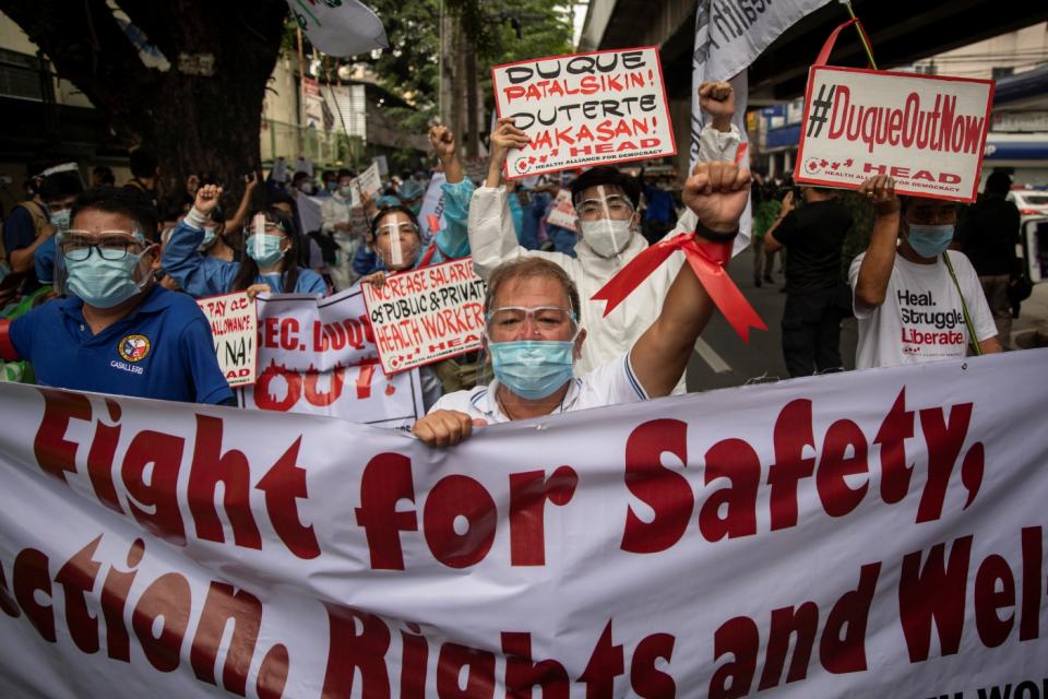Healthcare workers hold a protest outside the Department of Health (DOH), demanding better wages and benefits amid rising coronavirus disease (COVID-19) infections, in Manila, Philippines, September 1, 2021. (PHOTO: REUTERS/Eloisa Lopez)