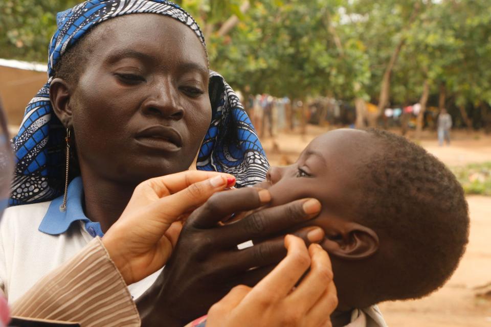 Infant receives medical care in Nigeria.