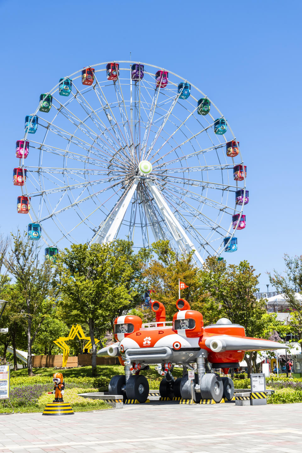 Taipei, Taiwan- August 28, 2021: Tourists wearing a mask are going to Taipei Children's Amusement Park in Taiwan.