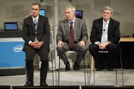 Intel CEO Brian Krzanich (L), executive vice president and CFO Stacy Smith (C), and executive vice president and general manager of the technology and manufacturing group Bill Holt (R) answer questions during an investors conference in Santa Clara, California, November 20, 2014. REUTERS/Beck Diefenbach