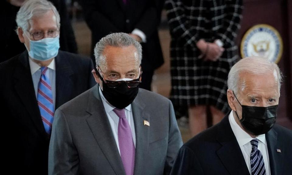 Joe Biden, right, with the Republican and Democratic leaders in the Senate, Mitch McConnell, left, and Chuck Schumer