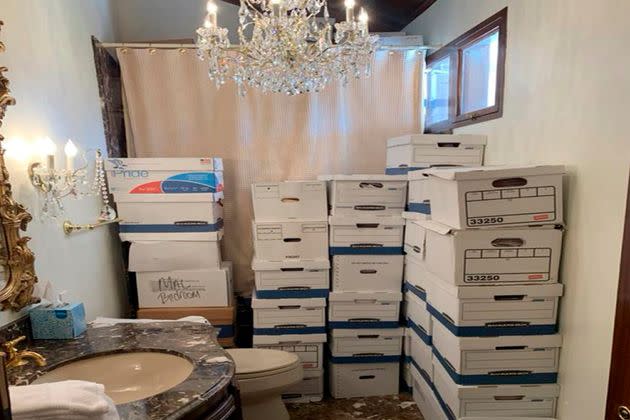 This image, contained in the indictment against former President Donald Trump, shows boxes of records stored in a bathroom and shower in the Lake Room at Trump's Mar-a-Lago estate in Palm Beach, Fla. (Justice Department via AP)