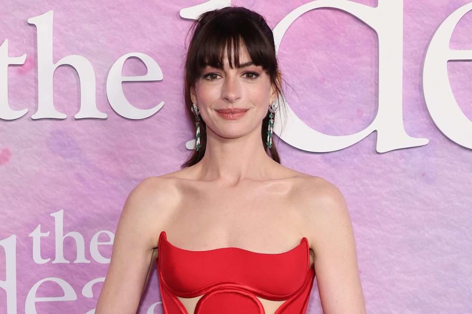<p>Cindy Ord/Getty</p> Anne Hathaway at the 