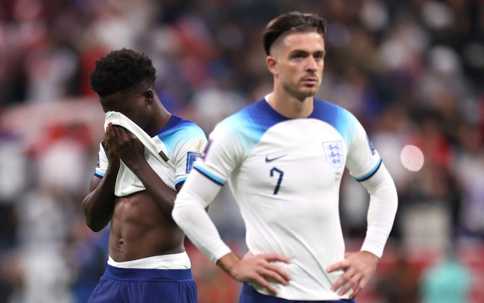 Bukayo Saka and Jack Grealish after the game - England torment as Harry Kane's missed penalty condemns Three Lions to World Cup defeat - Alex Pantling/GETTY IMAGES