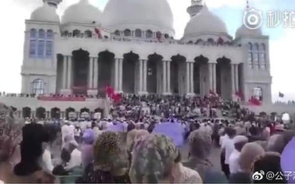 A large crowd of Hui people, a Muslim ethnic minority, began congregating at the towering Grand Mosque in the town of Weizhou on Thursday