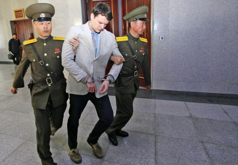 Otto, escorted at the Supreme Court in Pyongyang, where he was sentenced to 15 years of prison with hard labor.