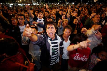 Supporters of presidential candidate Andres Manuel Lopez Obrador celebrate in Mexico City, Mexico July 1, 2018. REUTERS/Gustavo Graf