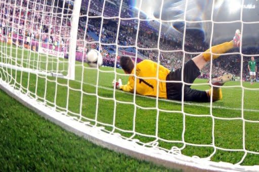 The ball bounces off the head of Irish goalkeeper Shay Given to make it 3-1 during the Euro 2012 football championships match Ireland vs Croatia at the Municipal Stadium in Poznan. Croatia won 3-1