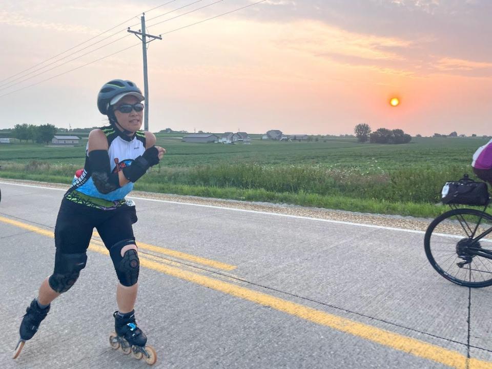 Jen Shyu skates her first RAGBRAI in 2021. Shyu is returning for RAGBRAI in 2022 with her partner Arnav "Sonic" Shah as part of a team of inline skaters.