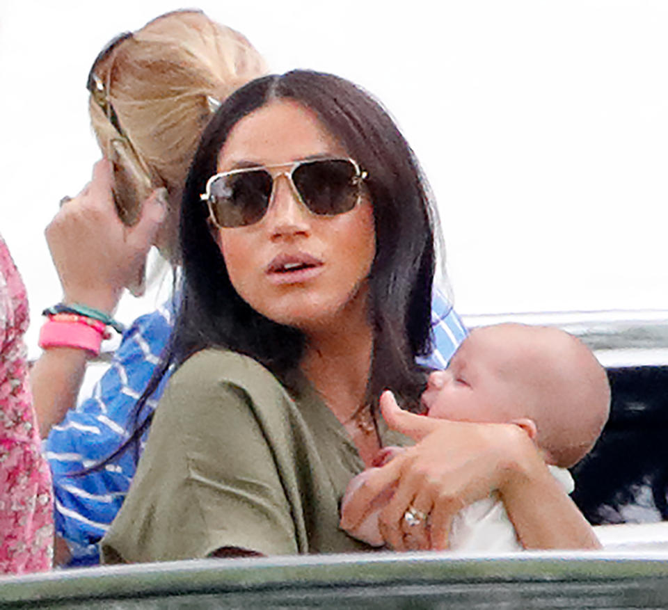 WOKINGHAM, UNITED KINGDOM - JULY 10: (EMBARGOED FOR PUBLICATION IN UK NEWSPAPERS UNTIL 24 HOURS AFTER CREATE DATE AND TIME) Meghan, Duchess of Sussex and Archie Harrison Mountbatten-Windsor attend the King Power Royal Charity Polo Match, in which Prince William, Duke of Cambridge and Prince Harry, Duke of Sussex were competing for the Khun Vichai Srivaddhanaprabha Memorial Polo Trophy at Billingbear Polo Club on July 10, 2019 in Wokingham, England. (Photo by Max Mumby/Indigo/Getty Images)