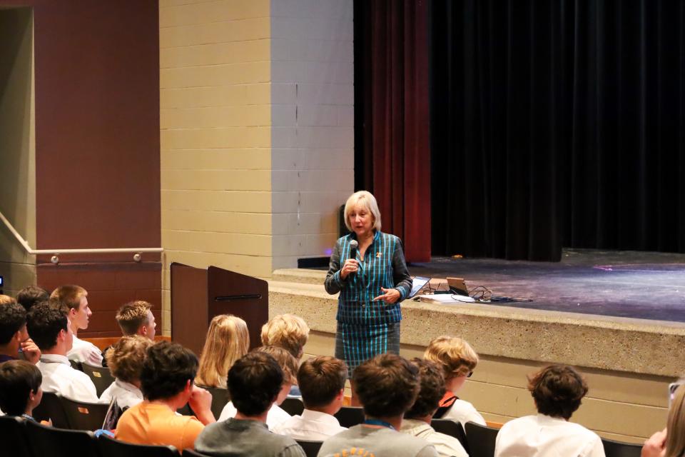 University of Tennessee at Knoxville Chancellor Donde Plowman interacts with a group of students at Father Ryan High School in Nashville.