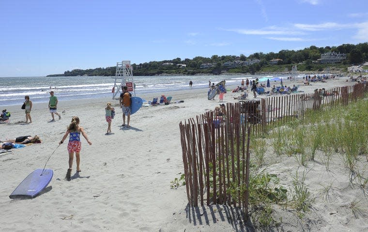 Beachgoers are drawn to Easton’s Beach in Newport every summer.